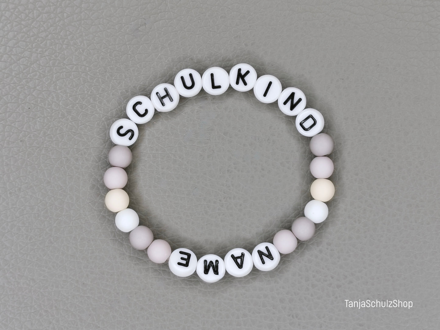 Kinder Armband Schulkind, personalisiert mit dem Namen des Kindes